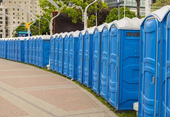 a row of portable restrooms at a trade show, catering to visitors with a professional and comfortable experience in Buckeye Lake